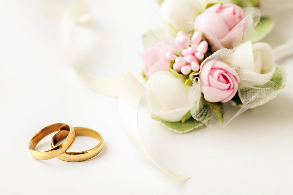 wedding rings and flowers
